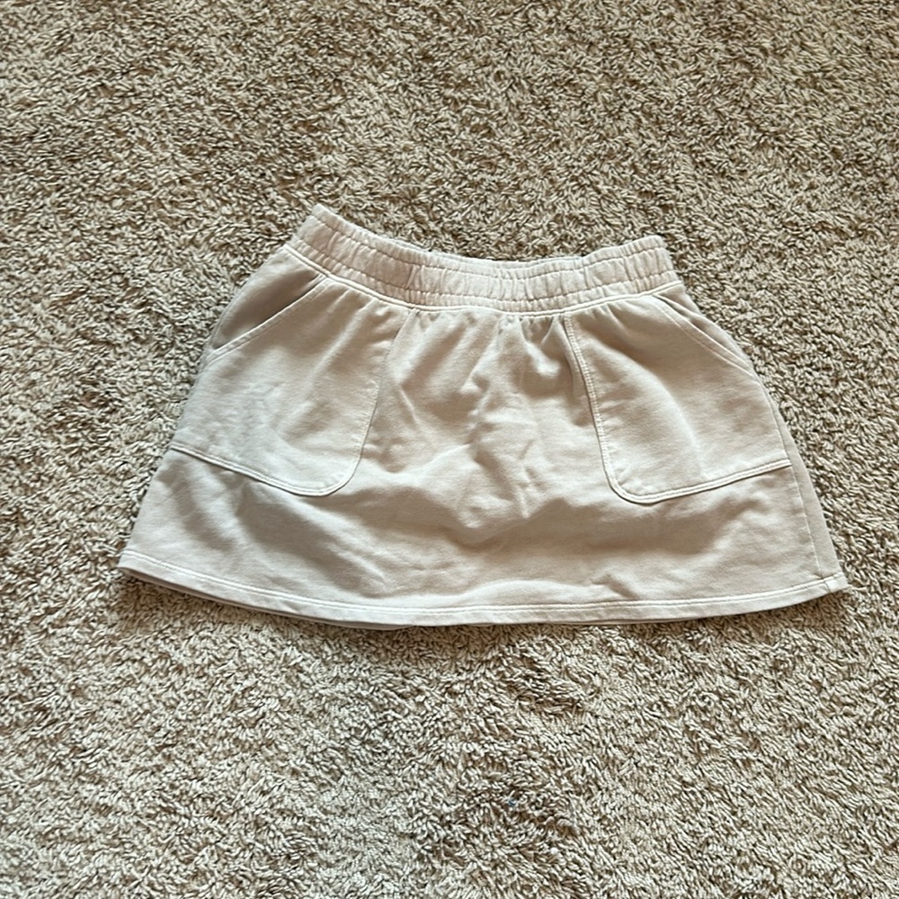 Tan skirt with a built in short underneath. adorable